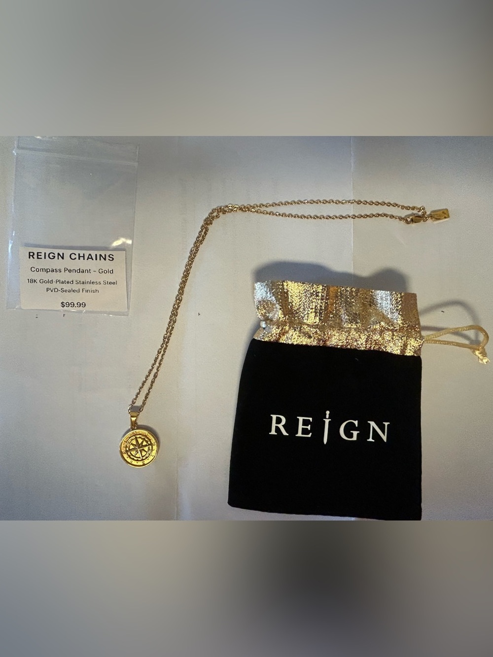 Reign Gold Pendant Necklace with Black Velvet Pouch